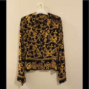 Black and gold top